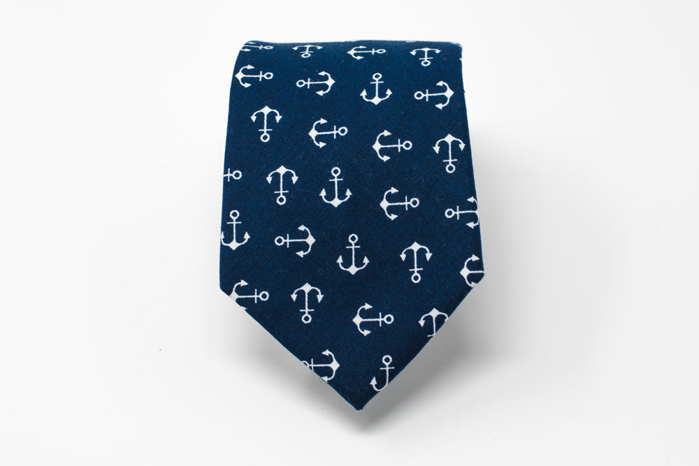 Rolled up Nautical Necktie. Blue with White anchors necktie that many would classify as an eccentric necktie