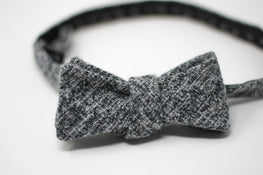 Sophisticated bow tie that has been tied. Known as the Gray Wool bow tie. However, it can be made as viscose bow tie for men and dapper gentlemen